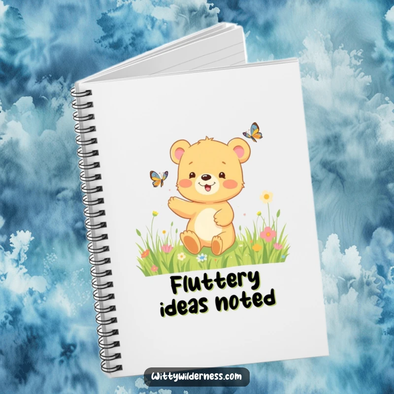 Funny notebook cover featuring a happy bear cub playfully chasing a butterfly in a vibrant meadow, perfect for jotting down joyful notes.