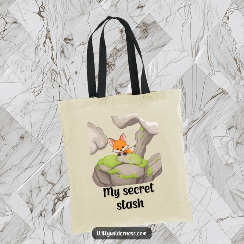 Funny tote bag with a curious fox peeking from behind a mossy rock, perfect for woodland-themed outings.